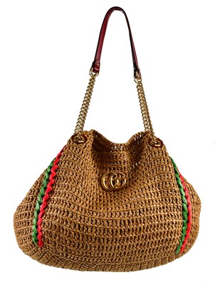 Lot 879 - GUCCI; a large light brown GG Marmont crochet...