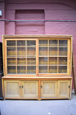 Lot 2415 - A large Victorian pine dresser, with sliding...