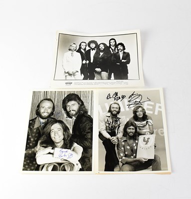 Lot 623 - BEE GEES; two black and white promotional...