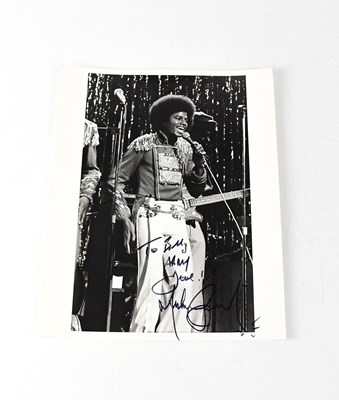 Lot 628 - MICHAEL JACKSON; a black and white promotional...