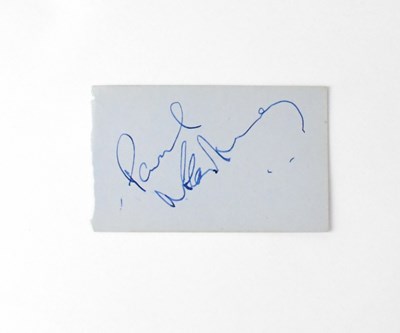 Lot 629 - PAUL MCCARTNEY; a torn page from an autograph...