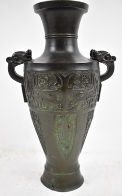 Lot 629 - A late 19th century Chinese bronze twin...
