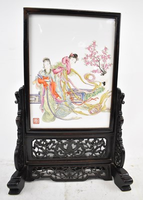 Lot 608 - A Chinese hand painted porcelain table screen...