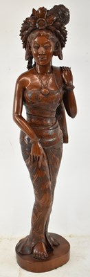 Lot 618 - A good quality Balinese carved wooden figure...