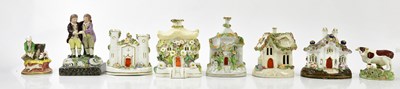 Lot 5384 - A small collection of ceramic cottages, height...
