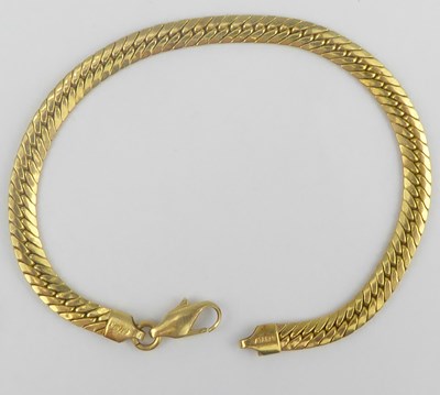 Lot 905 - A 14ct (585) gold herringbone link bracelet,...