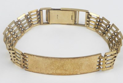 Lot 916 - A 9ct gold five bar gate identity bracelet,...
