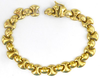 Lot 906 - A 14ct gold fancy link bracelet with repeating...