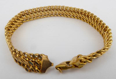 Lot 914 - A 9ct gold flexi woven link bracelet, with...
