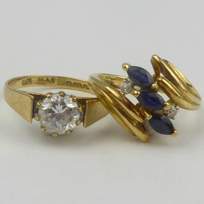 Lot 883 - A 9ct gold ring with claw set white stone,...