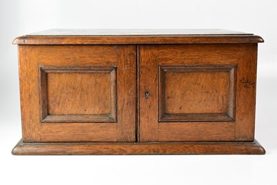 Lot 651 - A 1930s oak canteen of cutlery, part complete,...