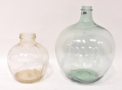 Lot 414 - A green glass carboy, height 55cm, together...