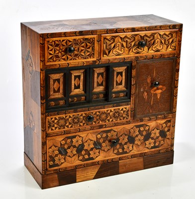 Lot 1378 - A Japanese inlaid tansu/jewellery cabinet,...