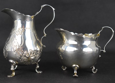 Lot 755 - Two hallmarked silver cream jugs, one...