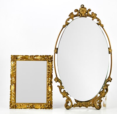 Lot 2542 - A gilt framed oval wall mirror with bevelled...