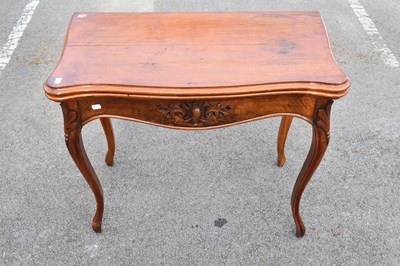 Lot 2483 - A late 19th century French carved walnut fold...