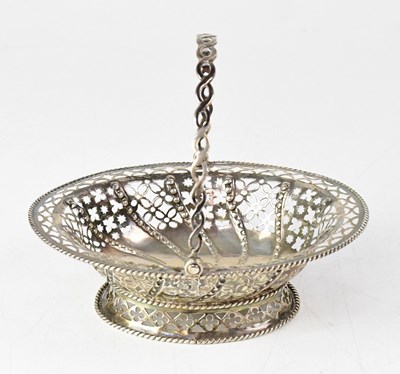 Lot 677 - A hallmarked silver pierced basket with swing...