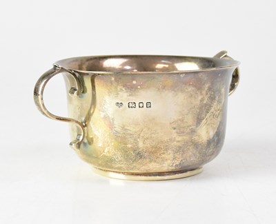 Lot 741 - A George V hallmarked silver twin-handled...
