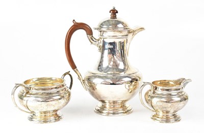 Lot 697 - A George V hallmarked silver three-piece part...
