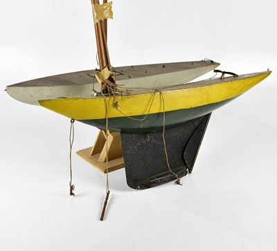 Lot 4422 - Two vintage wooden pond yachts, larger 113cm.