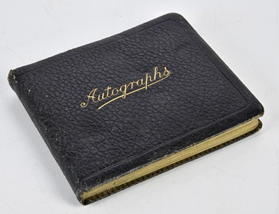 Lot 6038 - An autograph book to include signatures by...