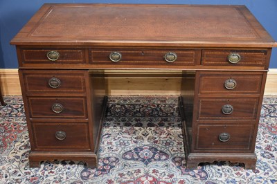 Lot 6565 - An Edwardian twin pedestal knee-hole desk with...