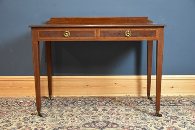 Lot 6608 - An Edwardian inlaid mahogany two drawer...
