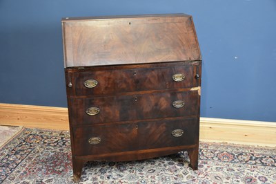 Lot 6691 - A 19th century mahogany bureau, the fall front...