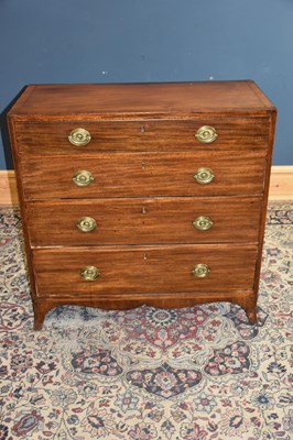 Lot 6568 - A George III mahogany chest of four drawers,...