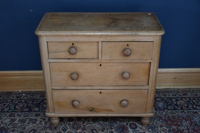 Lot 6531 - An old pine chest, with two short over two...