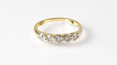 Lot 852 - A 14ct gold diamond five-stone ring, total...