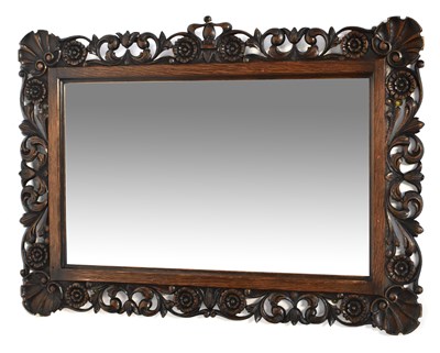 Lot 89 - An early 20th century carved and pierced oak...