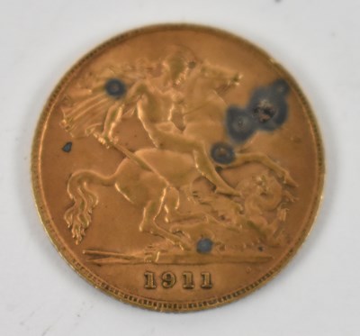 Lot 887 - A George V 1911 half sovereign.