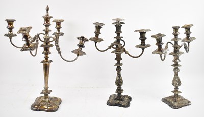 Lot 696 - A pair of silver plated three branch...