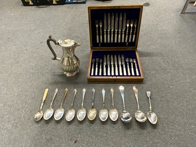 Lot 699 - An oak cased set of mother of pearl handled...