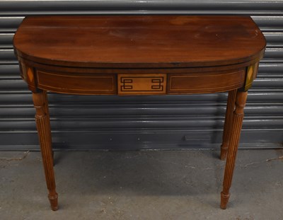 Lot 96 - A George IV mahogany and inlaid tea table with...