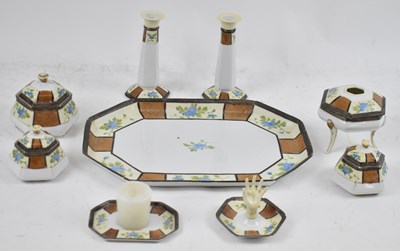 Lot 557 - NORITAKE; a nine piece dressing table set...