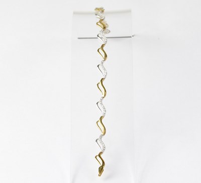 Lot 987 - A 9ct yellow gold bracelet with pavé set...