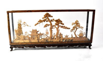 Lot 442 - An Oriental diorama in cork of a village scene