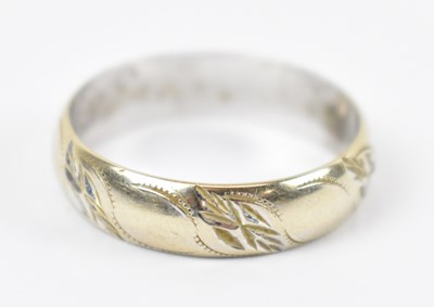 Lot 779 - An 18ct white gold ring, size V, approx. 5.6g.