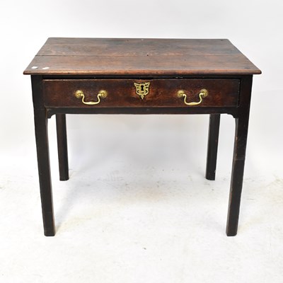 Lot 64 - A Georgian oak side table with single frieze...