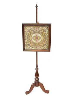 Lot 82 - A 19th century mahogany fire screen with...