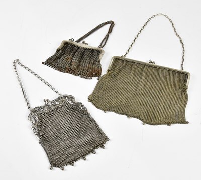 Lot 2429 - Three vintage mesh purses, one with white...