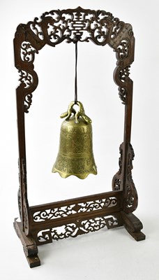 Lot 5311 - A Chinese carved hardwood and brass gong with...