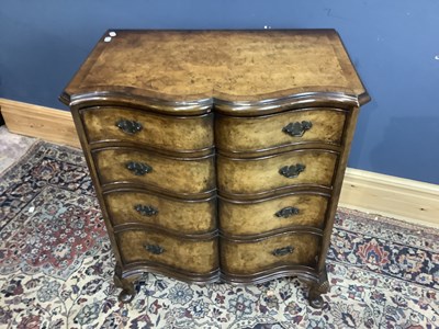Lot 6723 - A walnut and crossbanded serpentine front...