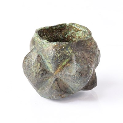 Lot 447 - A medieval iron mace head, height 3cm.