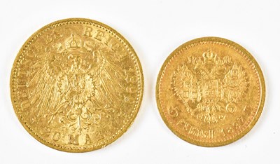 Lot 3139 - A Wilhelm II 1899 gold 20 Mark coin, 8g, and...