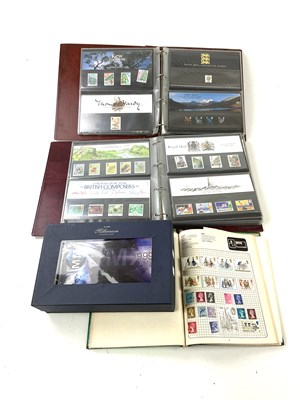 Lot 6032 - Two albums of Royal Mint First Day Covers,...
