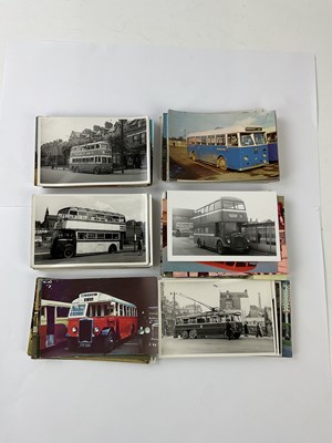 Lot 6052 - A collection of postcards relating to trams...