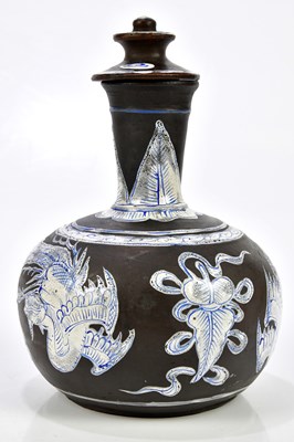 Lot 1195 - An Oriental, possibly Korean, terracotta jar...